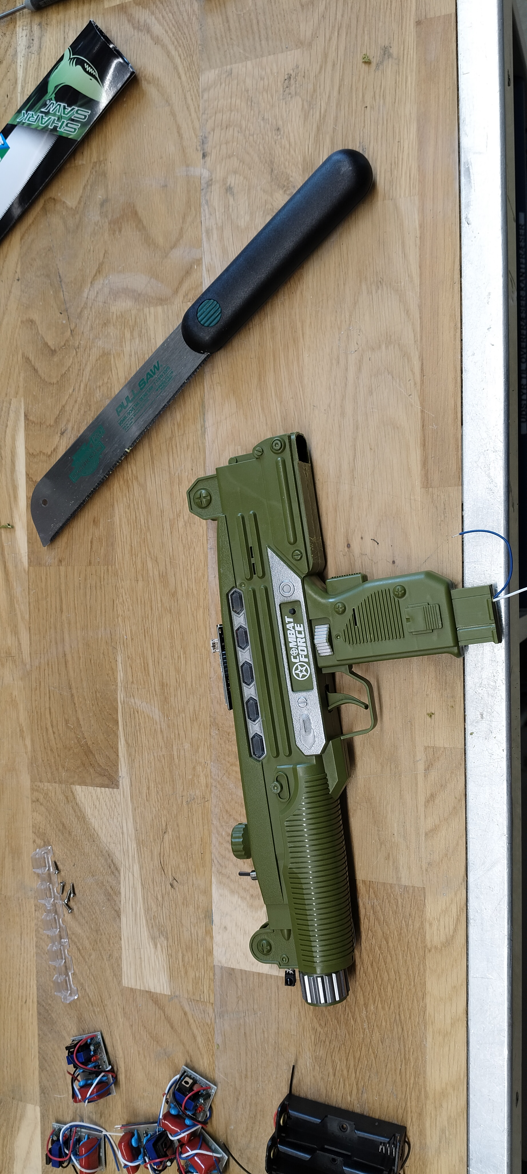 Sawing the large pistol frame for V2